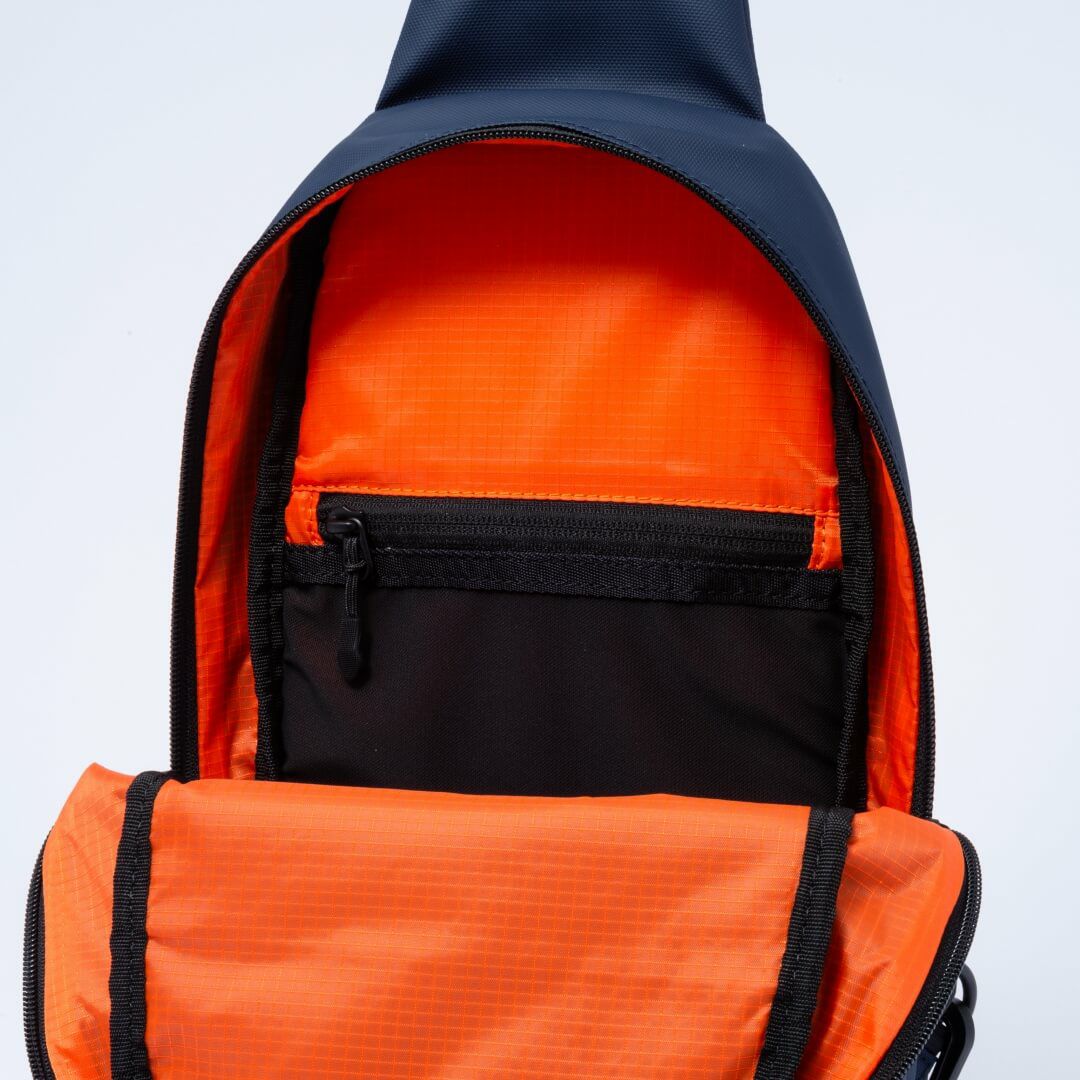 BEAMS DESIGN ELASTIC MESH ボディバッグ【BMMH0BS4】 ネイビー