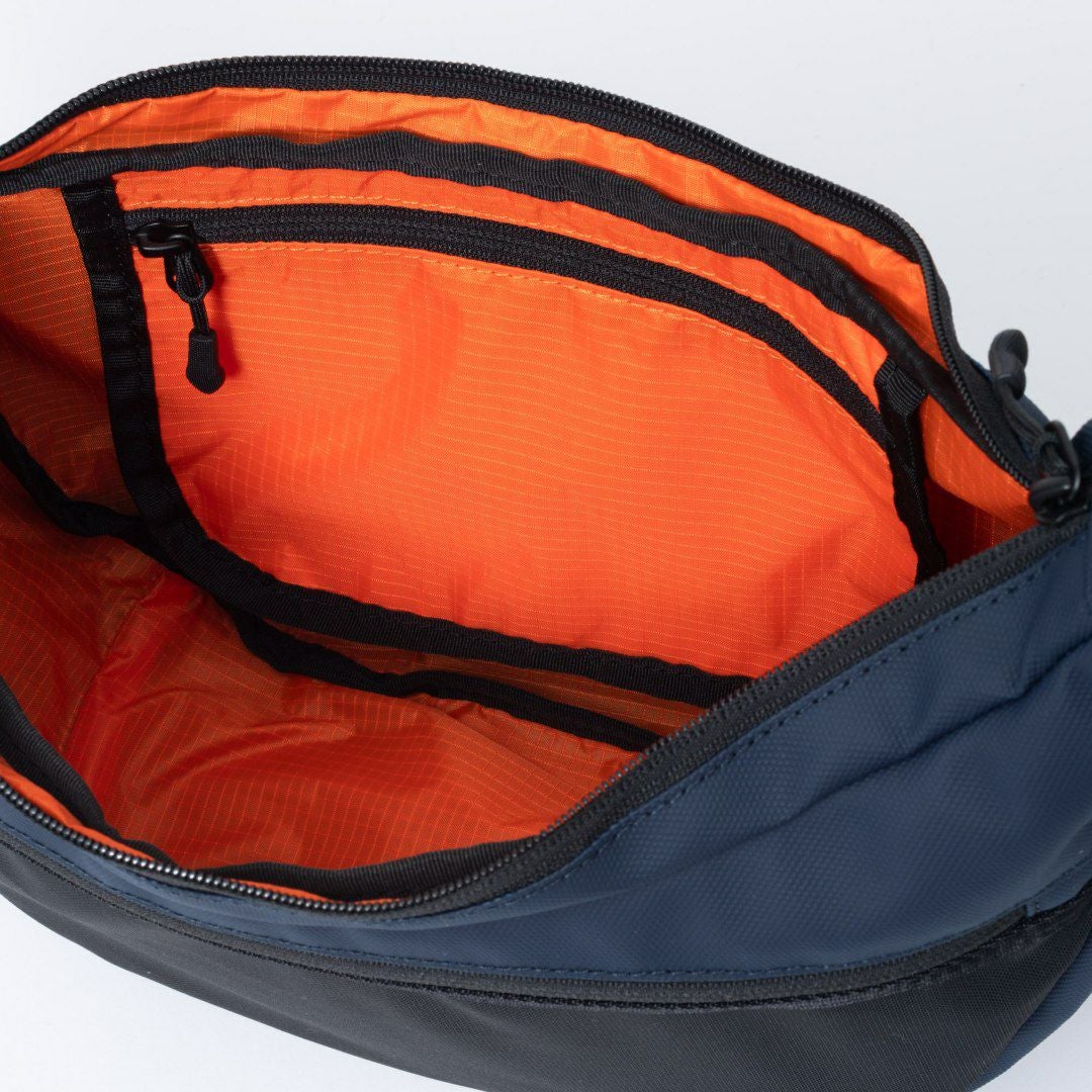 BEAMS DESIGN ELASTIC MESH ショルダーバッグ【BMMH0BSC】 ネイビー