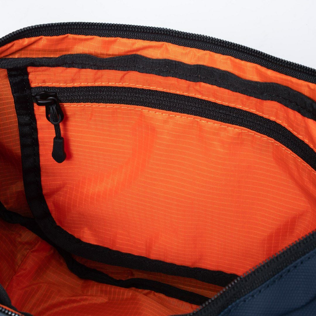 BEAMS DESIGN ELASTIC MESH ショルダーバッグ【BMMH0BSC】 ネイビー